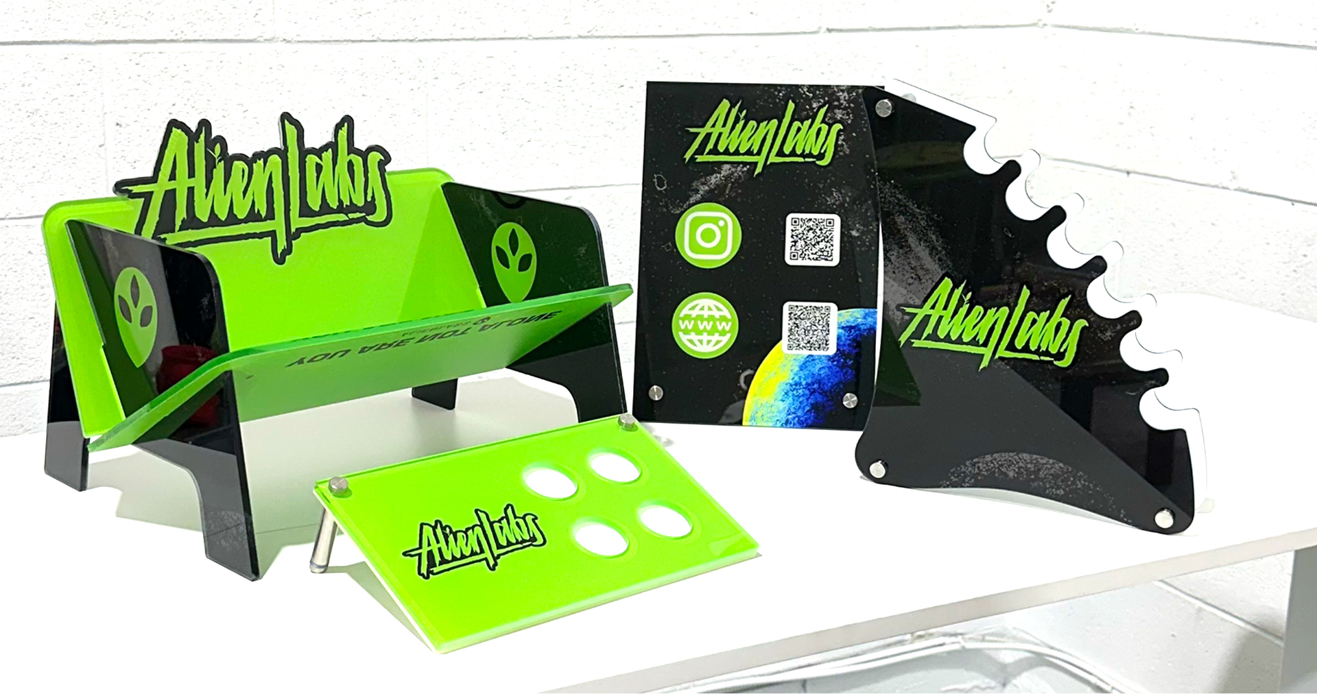 Custom neon green acrylic vendor displays for California Zalympix